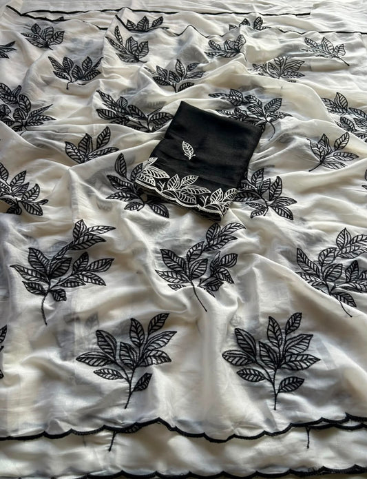 Chinnon silk saree with embroidery scalloped cut work border