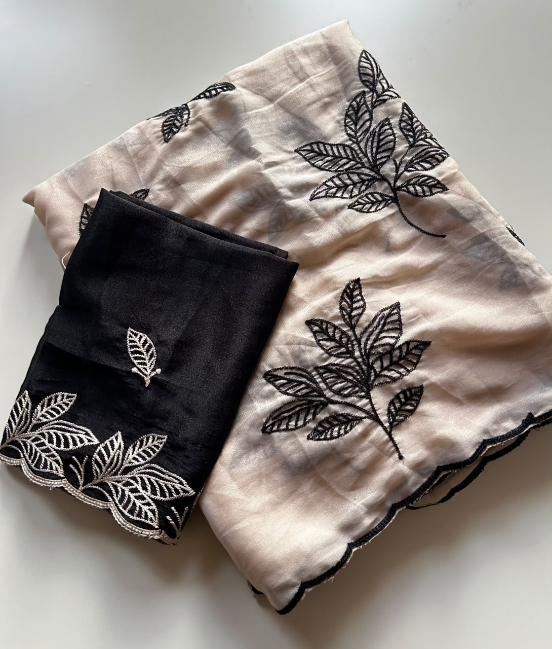 Chinnon silk saree with embroidery scalloped cut work border