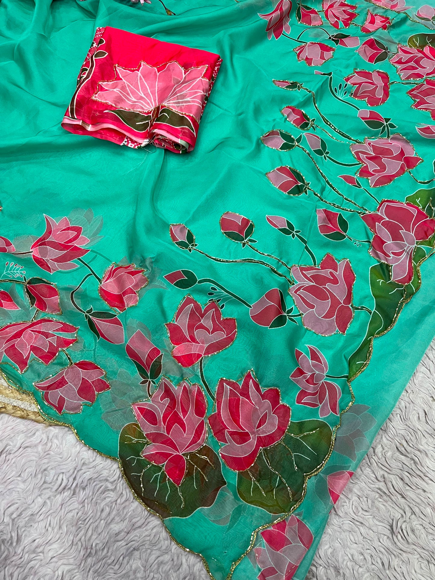 Beautiful lotus floral print saree with cutdana work