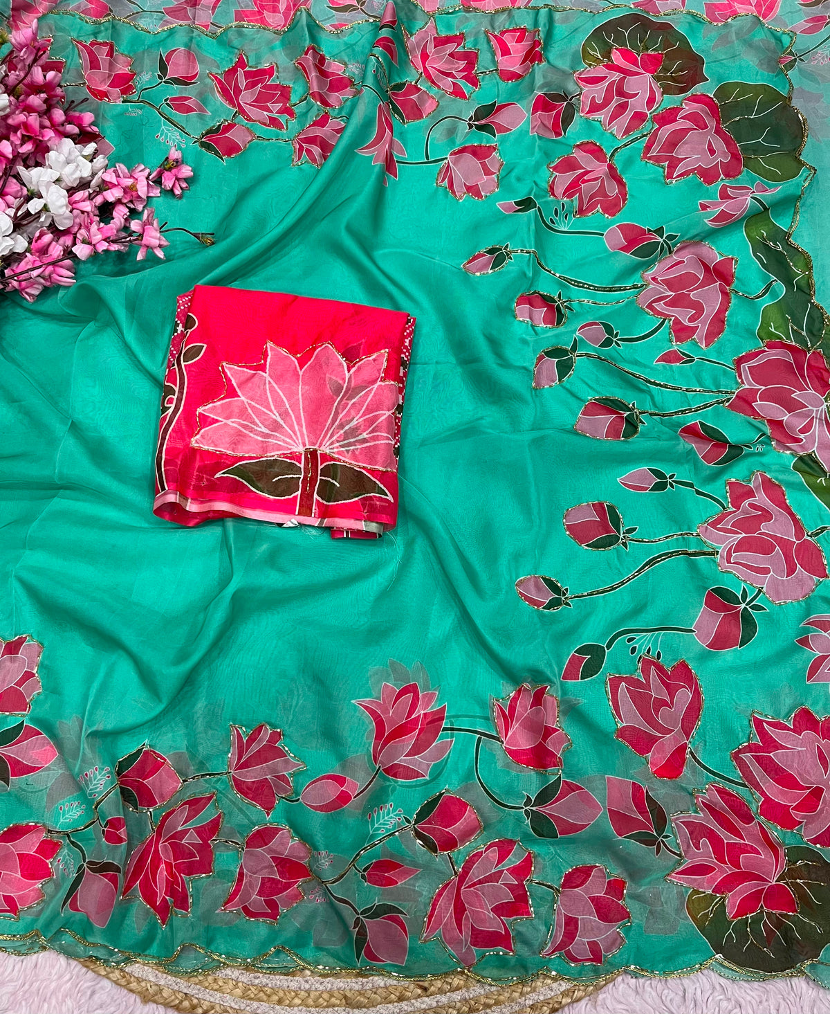 Beautiful lotus floral print saree with cutdana work
